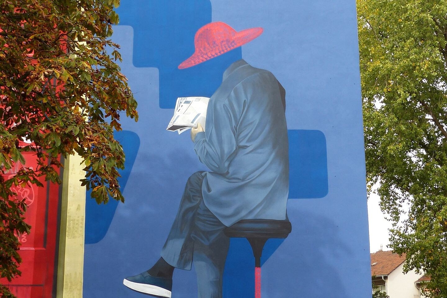 Mural in Müngersdorf zeigt sitzenden Mann aus Hongkong